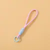 Correas de muñeca anti-pérdida de colores caramelo del fabricante original, personalización de pedidos pequeños, correas de muñeca tejidas inspiradas en la dopamina, compras corporativas, venta al por mayor