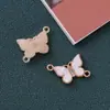 2024 pendientes de mariposa calientes transfronterizos colgante libro anillos dobles colgante de joyería collar pulsera DIY accesorios al por mayor
