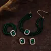 Collar y pulsera de perlas de imitación con flor de diamante francés, cadena de clavícula de nicho de moda, joyería de alta gama que combina con todo.