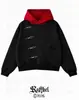 Moletom com Capuz Color Block Cor Niche Escura com Botões Metálicos Angulados, Gola Irregular, Ombro Caído Solto - Atacado