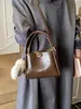 2026 Novo Estilo Moda Feminina Estilo Coreano Simples e Elegante Bolsa de Mão Bolsa Saco Bolsa de Ombro Cruzada Casual Bolsa Feminina