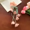 Goma para el pelo de Flor de Muguete con Borlas y Cintas, Accesorio de Alta Gama Estilo Hada para Coletas