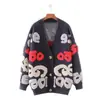 Nuevo cárdigan de punto estilo coreano, holgado y casual, de longitud media, de un solo botón, chaqueta de otoño e invierno para mujer con cuello en V y letra