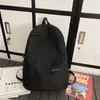Mochila estudantil moderna e versátil, grande capacidade, leve, design simples, adequada para o trajeto diário, com um toque de alta qualidade