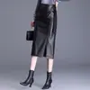 Falda midi con abertura irregular para mujer, nueva otoño/invierno 2026, falda de cuero PU de cintura alta adelgazante, elegante y simple, moderna