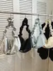 Bolso de mano de diseño nicho transfronterizo 2026 nuevo primavera-verano versión coreana de gran capacidad bandolera para estudiantes