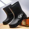 Zapatos impermeables de moda transfronterizos hasta la pantorrilla con cordón elástico, botas de lluvia para hombres, repartidores, ropa para exteriores, pesca, botas de lluvia antideslizantes
