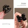 Presilha de Cabelo Pequena com Laço de Strass Estrela Mini Grampo para Franja Acessório de Cabelo Feminino para Lateral da Testa