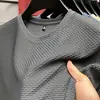 Camiseta de Malha de Bambu Seda de Gelo Masculina Manga Curta Verão Elástica Slim Fit Toque Gelado Casual Versátil Meia-manga Tendência