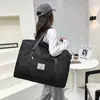 Nueva bolsa de almacenamiento para maternidad de gran capacidad para guardar edredones, conveniente para viajar, se puede acoplar a una maleta de ruedas para viajes de negocios y de placer.