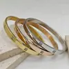 Pulsera Retro de Acero de Titanio de Gran Venta Transfronteriza con Circonita Micropavimentada Diseño Irregular Chapado en Oro de 18 Quilates No se Desvanece Punto al por Mayor
