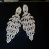 Pendientes colgantes de rombos con borlas tachonados de diamantes de aguja de plata transfronterizos europeos y americanos, pendientes exquisitos y de moda, pendientes versátiles y elegantes al por mayor