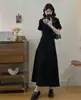 Vestido negro para mujer de talla grande con diseño de cinturón elegante que ciñe la cintura, elegante vestido adelgazante en estilos largo y corto