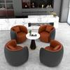 Sofá individual de cuero de lujo ligero, combinación de mesa y silla para recepción de hotel, salón de belleza, negociación, oficina