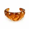 Pulsera ancha de resina con tachuelas en degradado vintage de venta caliente transfronteriza con apertura irregular, accesorio de mano de lujo simple y elegante al por mayor