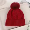 Bestseller transfronterizo de invierno: gorro tejido grueso con forro de polar y pompón, gorro clásico de punto trenzado versátil, gorro de lana de color liso a la moda