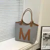 Bolso Tejido de Gran Capacidad para Mujer 2026 Nuevo Primavera Versátil Texturizado Bolso Tote de Gama Alta para la Escuela y el Trayecto