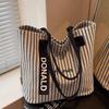Bolsa de Lona Listrada para Mulheres 2025 Nova Bolsa Tote Escolar de Grande Capacidade Estilo Coreano Bolsa Tote Ombro para Trabalho Leve Moderna