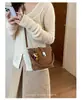 Bolsos de Diseño de Nicho Francés para Mujer 2026 Otoño/Invierno Nuevos Elegantes Versátiles Bolsos Cruzados Exquisitos Bolsos de Cubo de Mano