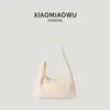 Bolsa hobo leve de nylon estilo coreano, um design transfronteiriço novo e moderno, simples e casual, versátil, adequada para estudantes, e pode ser carregada na mão ou usada como bolsa de ombro para o dia a dia.
