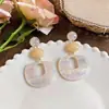 Pendientes de acetato ovalados serie rosa retro de aguja plateada pendientes de botón de estilo étnico de alta gama pendientes geométricos atmosféricos al por mayor