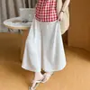 Pantalones de pierna ancha de seda de hielo blanca de maternidad Verano 2026 Estilo nuevo Holgados con caída Casual Pantalones tipo falda Petite