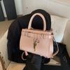 Bolso pequeño de alta gama para mujer, nuevo bolso bandolera retro versátil de otoño e invierno 2024, bolso de trabajo tipo cartera de moda.