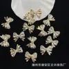 ABS Estampado en Oro Perla Sintética 22*29 Moño Pulsera DIY Cadena para Teléfono Colgante para Coche Accesorios Cuentas Moda Venta al por Mayor