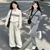 Conjunto Deportivo de Otoño para Niñas 2026 Nuevo Estilo Coreano Conjunto de Dos Piezas a la Moda con Sudadera Adornada con Plata para Niños Mayores