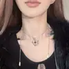 Collar colgante de piedra ojo de tigre hueca con forma de diamante estilo vintage para mujer, cadena para la clavícula versátil exquisita de nicho de lujo ligero con longitud ajustable