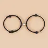 Pulsera de pareja con atracción magnética Runxin, moda simple, pulsera de empuje y extracción, cuerda de mano de Milán para comercio exterior transfronterizo de Europa y Estados Unidos