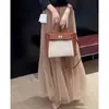 Saia Longa Plissada de Renda de Alta Qualidade para Mulheres Nova Coleção Primavera/Verão 2026 Cintura Alta Efeito Emagrecedor Elegante Versátil Corte Evasê