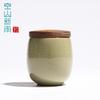 Tetera de cerámica sellada con tapa de madera de tamaño pequeño y creativa Xinyu de Empty Mountain, tetera pequeña universal de celadón Longquan, tetera para empaquetar té