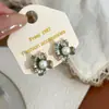 Pendientes de flor de perla vintage franceses dulces y etéreos de primavera y verano para mujer, diseño de nicho de lujo ligero, pendientes con encanto de hada
