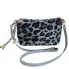 Bolso de felpa con puntos de onda para la axila de mujer 2024 nuevo otoño e invierno bolso de cadena de piel todo partido nicho estampado de leopardo bolso de hombro
