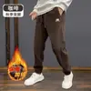 Calças de Veludo de Estoque de Fábrica Masculinas Outono/Inverno Largas Tamanho Plus Joggers Calças Longas Forradas com Fleece Roupa Esportiva Forrada com Fleece