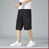 Pantalones cortos de algodón para hombre de mediana edad, pantalones cortos de algodón de papá, pantalones casuales finos de verano, pantalones de playa holgados de talla grande, pantalones de longitud media