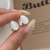 Niche Design Sense Ice-transparente Olho de Gato Pedra Dupla Face Gota de Água Orelha Fivela Requintado All-match Brincos Elegantes Leves Luxo Simples Brincos