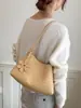 Bolso de mano tejido de alta gama transfronterizo, nuevo popular versátil para madre e hija de principios de otoño 2026, bolso de hombro