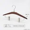 Percha para pantalones de madera maciza en color nogal negro, especialmente para tiendas de ropa, para uso doméstico y de hotel, sin marcas, antideslizante, percha con pinza de madera para pantalones al por mayor