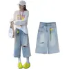 Jeans cortos rasgados de color azul claro estilo coreano para mujer, verano 2026, holgados de pierna ancha rectos vintage desgastados casuales