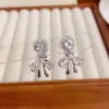 Pendientes de Clip de Moda de Nicho Versátiles de Corazón Completo de Diamante con Moño, Temperamento Único y Diseño Simple, Pendientes Súper Brillantes al por Mayor