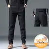 Pantalones de hombre casual de negocios ligeros, pantalones largos rectos de cintura elástica para primavera y otoño, nuevo estilo 2026, pantalones largos de mezcla de algodón para mediana edad