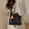 Bolsas de Moda de Diseño de Nicho para Madre e Hija de Este Año 2025 Nuevo Estilo Bolsos de Mujer Elegantes Versátiles Bolsos Cruzados Bolso de Mano Bolso Cubo