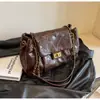 Bolso de Cadena Acolchado de Diamante Versátil de Moda para Mujer 2026 Nuevo Bolso Cuadrado Pequeño de un Solo Hombro Cruzado Versátil de Gama Alta para Viajes Diarios