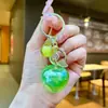 Accesorios creativos transfronterizos de mango y limón, llaveros de coche modernos y populares, colgantes de bolsa de frutas de alto valor
