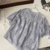 Verão 2025 Novo Moda Coreana Gola Redonda Bordada Camiseta de Manga Curta Feminina Design Solto Tops da Moda