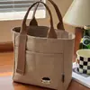 Nova Bolsa de Lona Bordada para Mulheres Ombro Único Estudante Deslocamento Portátil Bolsa de Lona Bolsa de Compras Japonesa Coreana Artística Ins