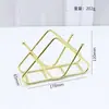 Suministro directo de fábrica, estilo nórdico, soporte vertical de hierro forjado para pañuelos, servilletas, artefacto de almacenamiento de papel de rollo para mesa de cocina