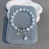 Pulsera de flor de melocotón de网红 con campanilla y ópalo natural, pulsera con colgante de carácter fu hueco, mismo estilo para amigas, diseño fresco